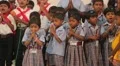 Little Indian kids in uniforms praying at school HD Footage