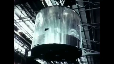 Little Joe II rocket sections are mated inside an aerospace plant on Wallops Stock Footage 93508468