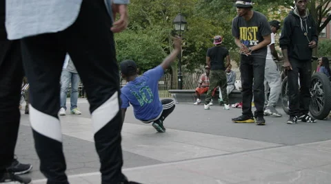 Little kid doing head-spin, breakdancing in Washington Square Park in 4K NYC Stock-Footage 55176068
