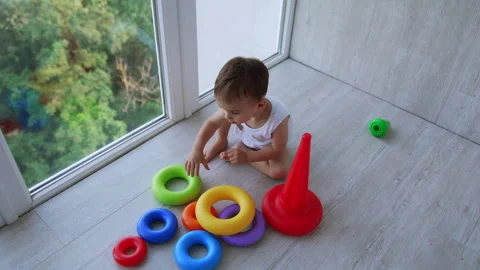 Little kid learning colors with the help of a game. Stock Footage 246837651