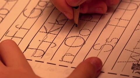 Little kid Learning To Write Letters, close up 動画素材 83394249