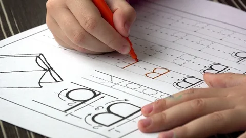 Little kid Learning To Write Letters, close up Stock Footage 86643737