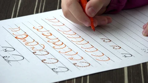 Little kid Learning To Write Letters, close up Stock Footage 86645098
