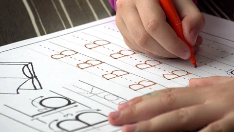 Little kid Learning To Write Letters, close up Stock Footage 86645156