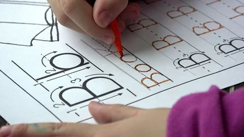 Little kid Learning To Write Letters, close up Stock Footage 86645183