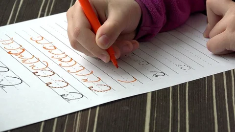 Little kid Learning To Write Letters, close up Stock Footage 86645185