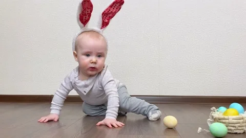 Little kid playing with colorful Easter eggs. Stock Footage 172583827