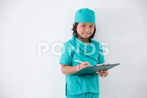 Little kid profession uniform as a nurse Stock Photos