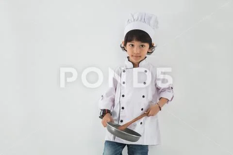 Little kid profession uniform pretending to be Stock Photos