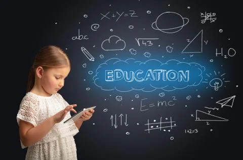 Little kid using on tablet with educational concept Stock Photos