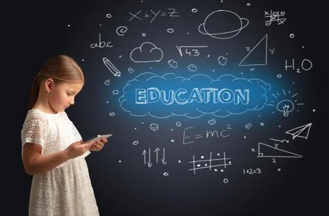 Little kid using on tablet with educational concept Stock Photos