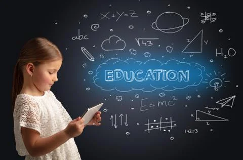 Little kid using on tablet with educational concept Stock Photos