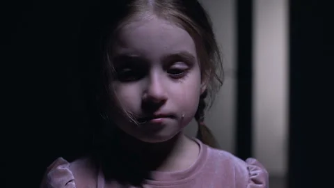 Little kidnapping victim crying on camera, child abuse, domestic violence result Video stock 108759864