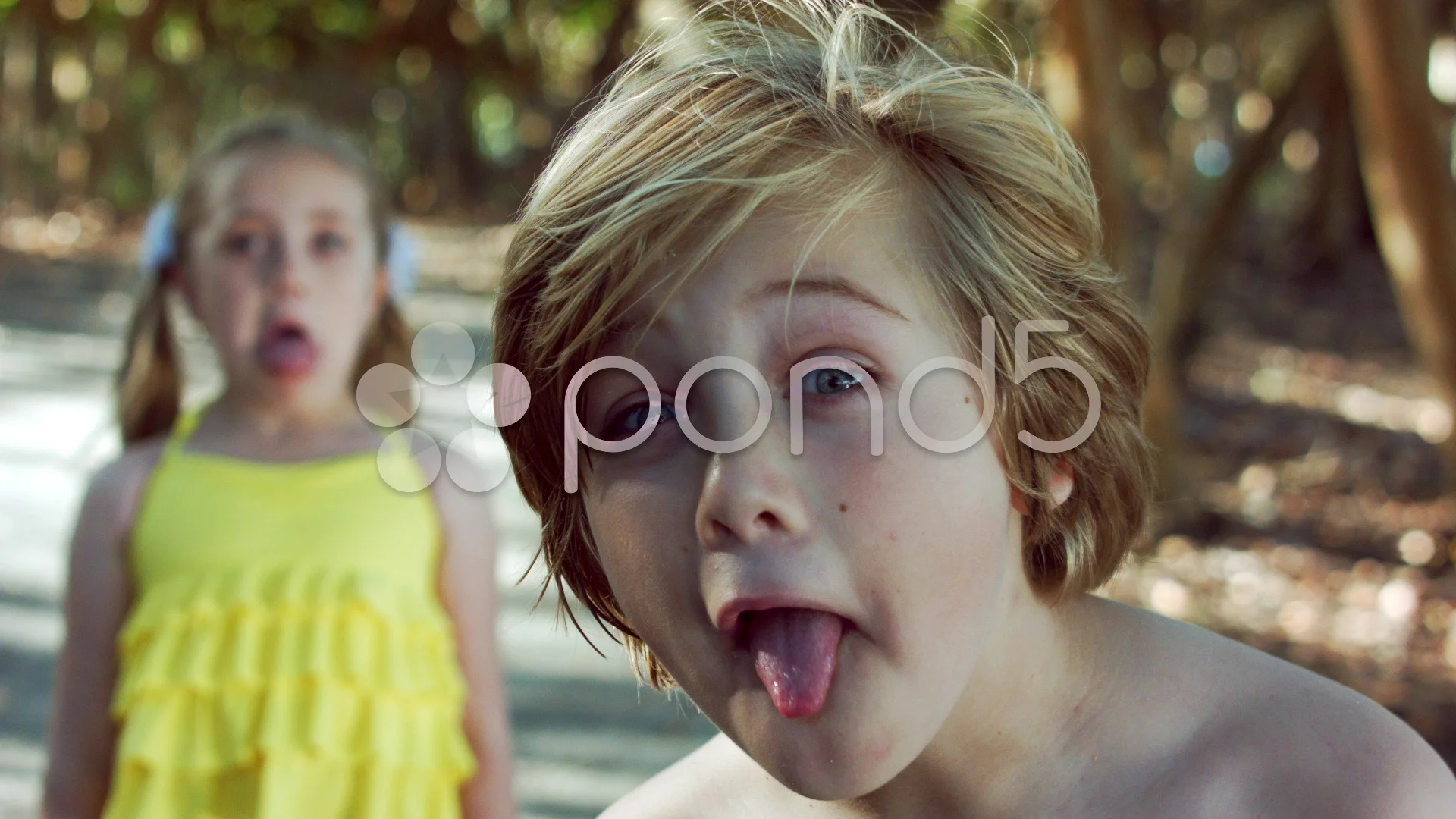 Little Kids Make Funny Faces At The Came... | Stock Video | Pond5