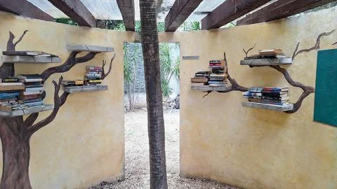 Little Library with Books on Tree-Shaped Shelves in Mexico Stock Photos