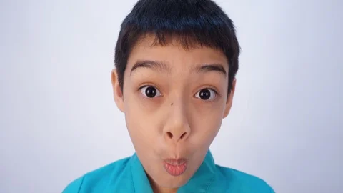 Little mix rate boy making fun face in many emotions Stockbeeldmateriaal 102412329