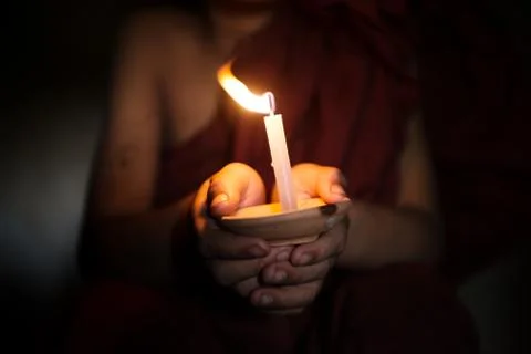Little monk blessing Stock Photos