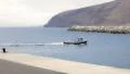 Little motorboat enter in port HD Footage