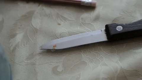 Little old knife on the table Stock Footage 89662205
