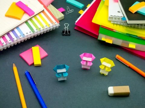 Little Origami Ninjas Helping Your Work on Your Desk When You Are Sleeping Stock Photos