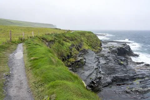 A little path next to the panoramic view of the cliffs of Mohor. Stock Photos