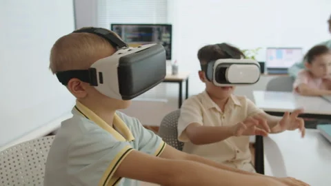 Little Programmers Engineering in AR Glasses at IT Class Stock Footage 280543137