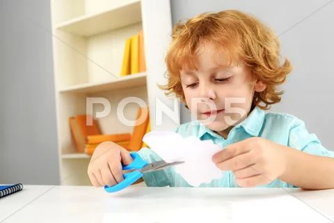 Little pupil at home Stock Photos