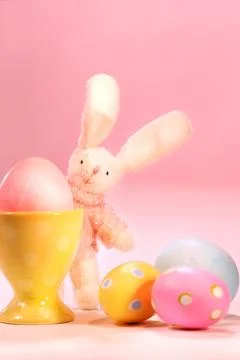 Little rabbit with a colored egg Stock Photos