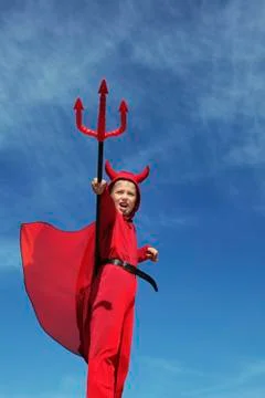 Little Red Devil Standing with a Trident Stock Photos