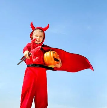Little Red Devil Standing with a Trident Stock Photos