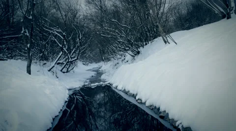 The little river and the snowfall Stock Footage 35162616