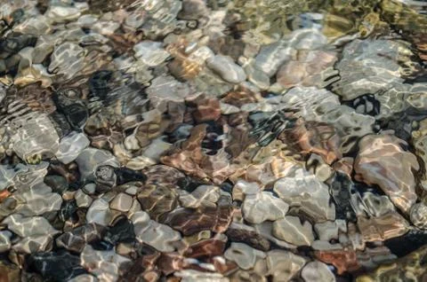 Little rocks in the sea Stock Photos