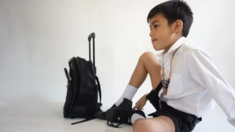 Little school boy prepare his bag for first day school Stock-Footage 89738657