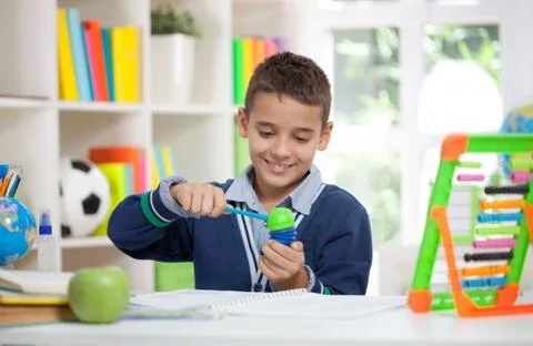 Little schoolboy sharp pencil Foto stock