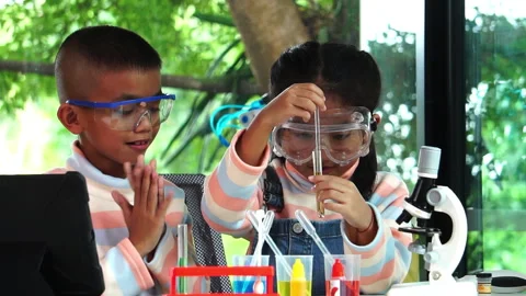 Little scientists are learning happily and interestingly Stock Footage 247197628
