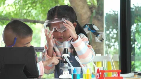 Little scientists are learning happily and interestingly Stock Footage 247496610