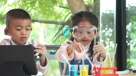 Little scientists are learning happily and interestingly Stock Footage 247496664