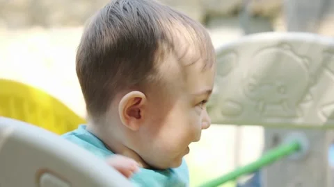 Little smiling boy playing with his mom on the playground Vídeo Stock 248740363