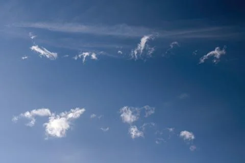 Little soft clouds drifting on a blue sky Fotos de archivo