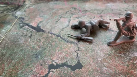 Little soldiers on the map of Ukraine. The concept of war in Ukraine Stock Footage 230011368