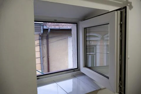Little squared window on the wall Stock Photos
