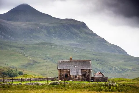 Little stone house in a middle of a mountain, highlands, scotland Stock Photos