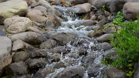Little Stream on the Rocks Slow Motion Inversion Stock Footage 283076410