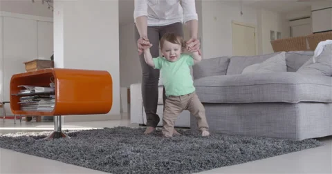 Little toddler learning to walk Stock-Footage 50144384