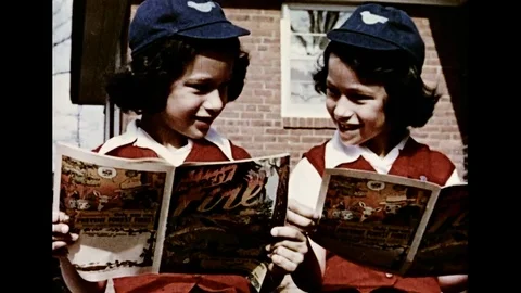 Little Twins Reading Comics Stock Footage 105181534