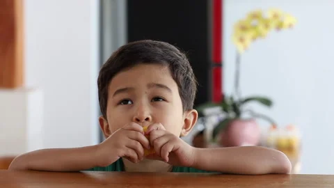 Little vegan boy eats corn. Four years boy loves vegetables. Stock Footage 159487715