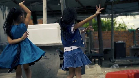 Little Vietnamese Girls Dancing in Slow Motion Stock Footage