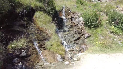 Little waterfall in the mountains 스톡 동영상 331522089