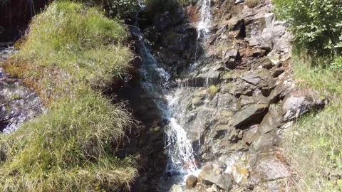 Little waterfall in the mountains Stock Footage 331522093
