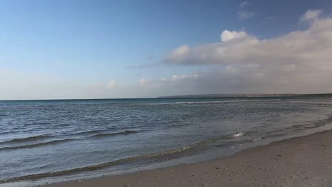 Little waves at the beach Stock Footage 73120335